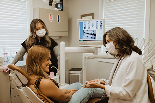 Woman getting dental exam from Dr. Courtney Cleary, at Cleary Dental in Haddonfield, NJ.